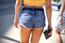 woman wearing blue denim short shorts
