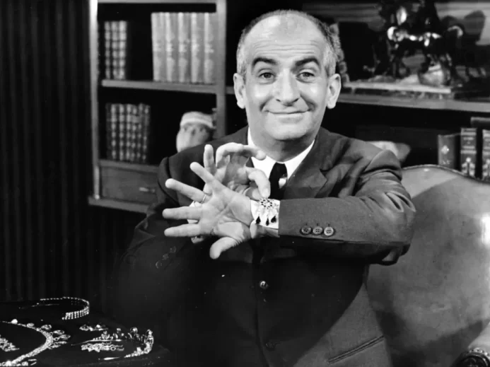 Louis de Funès Louis de Funès sedící na křesle